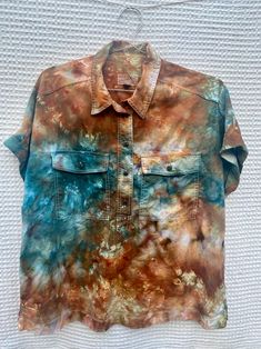 Ice Dye Short Sleeve Utility Button-Down Shirt, Utility Button-Down, Brown and Blue Ice Dye Shirt, Collared Short Sleeve Shirt, Hand Dyed Shirt, Gifts for Her, Unique, Earthy Tones, Womens Top, Ice Dye Shirt, Ice Dyed Shirt, Festival Clothing, Festival Clothing Women, Festival Outfit, Boho Tops for Women, Boho Tops, Button-Down Shirt, Women's Button-Down Shirt, Short Sleeve Cotton Blouse, Ice Dye Short Sleeve Button-Down, Ice Dyed Short Sleeve Button-Down, Popover Shirt Women, Hand-Dyed Ice Dye Bohemian Short Sleeve Shirt, Bohemian Shirt With Relaxed Fit And Button Closure, Bohemian Relaxed Fit Shirt With Button Closure, Vintage Tie Dye Tops, Casual Hand Dyed Brown Tops, Bohemian Collared Shirt With Buttons, Bohemian Hand Dyed Relaxed Fit Tops, Tie Dye Short Sleeve Top, Casual Tie Dye Short Sleeve Top