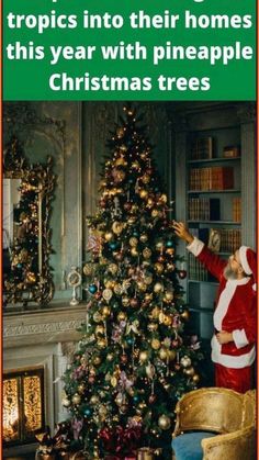 a man dressed as santa claus decorating a christmas tree