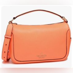 Kate Spade Smoosh Crossbody Orange Leather / Color Code: Melon Ball (801) New With Tags; Authenticity Guaranteed! K6047 / Retail $379 Our Crossbodies Are Perfect If You Want To Carry Your Important Things Without All The Bulk. Plus, Your Hands Are Free To Keep Up With All Your Group Texts And Grip That Vanilla Latte. Details Size 7.28"H X 10.5"W At Bottom12.01"W In The Middle X 4.29"D Inches Approximate Strap Drop 22" Refined Grain Leather Authentic Kate Spade, Dust Bag Not Included Pebbled Leat Orange Handbag, Kate Spade Outlet, Vanilla Latte, Michael Kors Outlet, Orange Leather, Color Code, Kate Spade Bag, Kate Spade Crossbody, Pebbled Leather