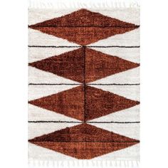 a brown and white rug with different shapes