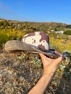 "brown cow print hat with topaz rhinestones  bottom rim This is one size fits most, theres a drawstring to adjust sizing.  The hat can also be molded for a lower or higher curl. Already made and Currently out of town so theres a delay in shipping. shipping within 4-5 business days  ! Stunning in person  Perfect for Coachella , stagecoach, Nashville, country concerts, birthdays Please note that the hats are handmade and may have some variances and blemishes. If any, they are very minor . The hats Brown Sun Hat For Rodeo, One Size Fits Most, Brown Sun Hat For Rodeo, One Size, Brown Sun Hat For Rodeo, Brown Bucket Hat For Country Events, Cow Print Hat, Rhinestone Cowboy Hat, Queen Of Hearts Halloween, Brown Cow Print, Nashville Country