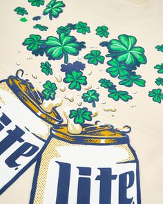 a beer can with shamrock leaves coming out of it