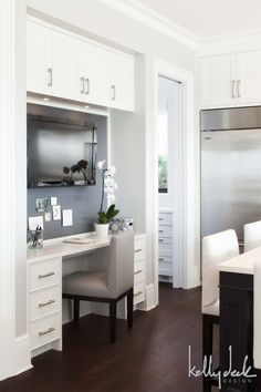 the kitchen is clean and ready to be used as a home office or work space