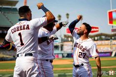 the baseball players are celebrating on the field