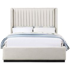 a bed with a white headboard and pillows on top of it, against a white background