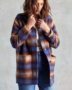 For those who appreciate timeless statement pieces, this car coat is a warm, endlessly versatile winter essential crafted from luxurious 100% recycled fibers and designed with an oversized fit for easy layering. The nearly three-dimensional shadow plaid and authentic details make it a pinnacle piece in any wardrobe. Sorted, recycled, spun, and woven in Italy, our partner Manteco created a plush fabric that is made from a blend of recycled wool and recycled nylon, helping to divert pre- and post- Car Coat, Plush Fabric, Winter Essentials, Outerwear Women, Three Dimensional, Statement Pieces, Coats For Women, Layering, Mens Shirts