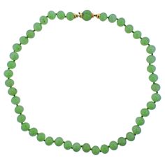 18k gold clasp necklace with 10.5-11mm jade beads. Necklace is 23" long. Marked 750. Weight -101.3 grams. Elegant Hand-strung Jade Necklace, Classic Jade Necklaces With Round Beads, Classic Jade Necklace With Round Beads, Formal Single Strand Jade Jewelry, Formal Single Strand Jade Necklace, Formal Single-strand Jade Jewelry, Large Bead Necklace, Gold Bead Necklace, Clasp Necklace