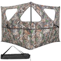 an image of a hunting blind with the side open and straps attached to it's sides