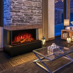 a living room filled with furniture and a fire place next to a window covered in windows