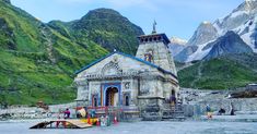 an old church in the middle of mountains