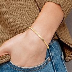 Mix and match this 10K gold bangle with all your other pieces! This is the classic plain polish bracelet you have been searching for. Width 3mm, Bracelet Circumference: 8.25 Classic Bangle Bracelet With Simple Design, Classic Gold Bangle For Everyday, Minimalist Tarnish Resistant Name Bangle Bracelet, Minimalist Shiny Bangle Bracelet, Minimalist Polished Bangle Chain Bracelet, Simple Design Yellow Gold Bracelet, Gold Sterling Silver Stackable Bangle Bracelet, Sterling Silver Bracelet In Yellow Gold Finish, Classic Yellow Gold Cuff Bracelet For Everyday