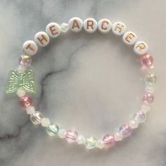 a bracelet with the word's name on it