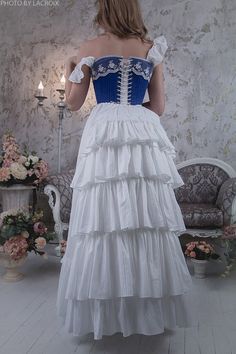 A beautiful Victorian petticoat is made from cotton and ruffled at the bottom edge and backside. Usually, it's worn under the bustle gown. In these pictures, a bustle cage is worn under the skirt. Please take attention that the bustle cage is not included in this price! But you can order it here: https://etsy.me/2TpD2E6 This underskirt will be perfect for Victorian and Edwardian events, parties, weddings, and theater productions. The closure skirt is constructed such that it can balance waist si Steampunk Wedding Dress, Victorian Bustle, Wedding Dress Bustle, Bustle Skirt, Under The Skirt, Vintage Wardrobe, Classic Wedding Dress, A Line Gown, Beautiful Skirts