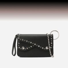 This studded biker crossbody bag from Dolce & Gabbana is so sleak, you might have a hard time keeping your hands off of it 😍😎 With Love We Stride sendegaro.com #DolceGabbana #sendegaro #designerclothing #designerswear #dolcegabbanashoes #dolcegabbanabag #dolcegabbanadress #dolcegabbanawomen #dolcegabbanamen #dolcegabbanastyle #effortlessfashion New Years Look, Hard Time, Casual Everyday