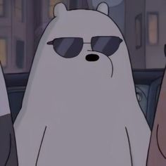 a polar bear wearing sunglasses standing next to other bears