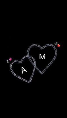 two hearts chained to each other with the letters m and a on them, in front of a black background