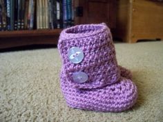 "This listing is for a pair of adorable baby Uggs type boots. With cold weather just around the corner, now is the time to start thinking about toasty warm little tooties. These baby boots are made with soft acrylic yarn made in a tight stitch to keep the cold out and baby's feet nice and warm. They are machine washable and dryer friendly. They open and close with 2 buttons on the sides of the boots. This pair is done in a lavender, but we can do any color you would like. Simply convo me as spec Wine Cork Tree, Wine Cork Ornaments, Knit Beanie Pattern, Pom Pom Baby, Christian Ornaments, Baby Uggs, Baby Shoes Pattern