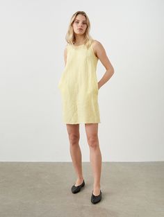 "This is a ready-to-ship item. All sizes and full color swatch available in regular selection.  Linen tank dress with snap fastening all over back. Easy to style, but far from boring with its raw hem and snaps at the back. Offered in medium-weight and exclusive linen. STYLE DETAILS * Regular fit * A-line silhouette * Raw hem detail * V-neck and deep v-back * Snap back * 2 inside pockets * Mini length * Made from medium-weight and exclusive linen SIZES & COLORS IN THE PICTURES * Model 1 is wearing size S in Butter Yellow (medium) linen. Model's height - 176 cm (5'9\"), bust - 83 cm (32.7\"), waist - 60 cm (23.6\"), hips - 89 cm (35\").  CUSTOMIZATION * Customization is possible, but such items are non-changeable & non-refundable * There is extra charge depending on the particular customizat Linen Mini Dress For Daywear, Sleeveless Linen Mini Dress For Summer, Linen Sundress Mini Dress, Linen Sundress In Mini Length, Knee-length Linen Mini Dress For Daywear, Casual Linen Mini Dress, Casual Linen Mini Dress For Summer, Casual Linen Mini Dress With Relaxed Fit, Casual Relaxed Fit Linen Mini Dress