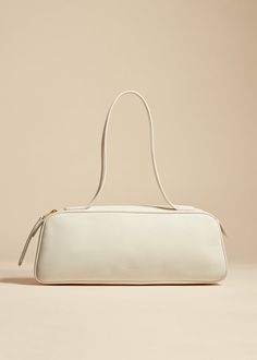 Simona Shoulder Bag in Cream Leather Elegant Evening Shoulder Bag With Long Strap, Elegant Leather Bag With Long Strap, Elegant Shoulder Bag With Long Strap For Everyday, Elegant Rectangular Shoulder Bag With Lined Interior, Elegant Baguette Bag With Zipper Closure, Elegant Everyday Bags, Elegant Leather Shoulder Bag With Lined Interior, Elegant Baguette Bag With Zipper For Daily Use, Elegant Rectangular Bag With Long Strap