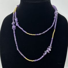 "🌼 Long beaded necklace by Kinsley Armelle.  Small faceted lavender beads with Amethyst chip and gold bead accents.  Can be worn as a single long strand or doubled. 🌼 Measures: 40\" 🌼 Condition: very good, minimal wear. Please see photos for complete condition. To view more vintage jewelry and boxes in my shop, please visit: https://www.etsy.com/shop/TheVintageDaisyVault?ref=seller-platform-mcnav§ion_id=25440304" Elegant Gemstone Beads In Gold, Double Strand Amethyst Gemstone Beads Jewelry, Adjustable Amethyst Jewelry With Polished Beads, Elegant Purple Faceted Beads Gemstones, Beaded Amethyst Jewelry With Round Beads, Purple Double Strand Natural Stones Jewelry, Double Strand Purple Jewelry With Natural Stones, Purple Double Strand Jewelry With Natural Stones, Gold Rondelle Beaded Necklace With Natural Stones