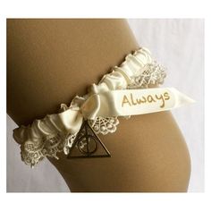 a harry potter garter belt with the words always on it and a hogwarts pennant