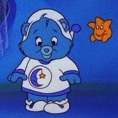 a cartoon bear is standing in front of a goldfish and jelly fish on a blue background