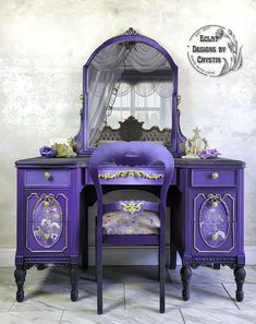 a purple dressing table with a mirror and stool