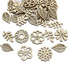 wooden cutout shapes with leaves and flowers