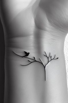 a small branch with two birds on it is shown in black and white, as well as the word love