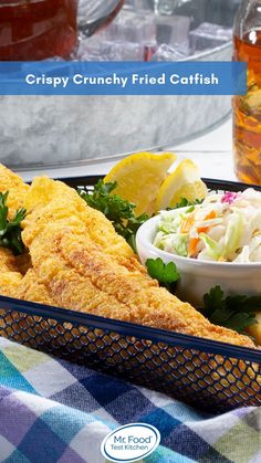 crispy crunchy fried catfish served with coleslaw and lemon wedges