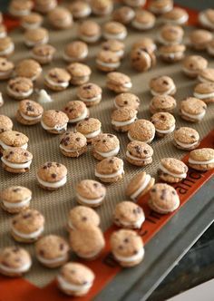 there are many small cookies on the cookie sheet