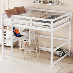 a white loft bed with desk underneath it