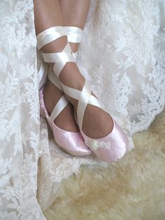 This lovely pale pink  bridal ballet style shoe  is an elegant and comfortable choice to  dance your way through your wedding day! Made of pale pink satin and embellished  with hand made tulle roses, pearls and lace,  they are a tasteful compliment to almost any gown from casual to elegant.  Satin ribbons tie ballerina style. Lined in satin and padded ,  their comfort will allow you to enjoy your day to the fullest. All of the shoes in my shop are individually custom made  by me, to each bride's specific measurements .  Please see the last photos for visual instructions on how to measure your feet while standing with your weight on them. 1. LENGTH 2. WIDTH 3. TOP WIDTH 4. HEEL WIDTH 5. ANKLE You MUST INCLUDE these measurements when ordering. Thanks for visiting my shop, be sure to look aro Luxury Pink Round Toe Wedding Shoes, Wedding Shoes Bride Light Pink, Pink Wedding Flats For Bride, Ballet Shoes For Wedding, Pink Ballet Dance Shoes With Round Toe, Pink Round Toe Ballet Dance Shoes, Wedding Ballet Flats With Satin Bow, Wedding Closed Toe Ballet Flats With Satin Bow, Elegant Wedding Ballet Flats With Satin Bow