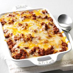 a casserole dish filled with meat and cheese