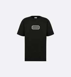 The T-shirt is a relaxed and modern piece. Crafted in black cotton jersey, it features a Christian Dior Couture signature in a contrasting embroidered frame on the chest. Thanks to its relaxed fit and ribbed crew neck with V-neck topstitching, the T-shirt will pair effortlessly with any jeans for a contemporary look.. Denim Swimsuit, Versace Jacket, Off White Jacket, Burberry T Shirt, Dior Star, Versace T Shirt, Versace Sweatshirt, Mens Casual Dress Outfits, Christian Dior Couture