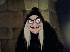 an animated character with long white hair and green eyes wearing a black hooded outfit, standing in front of a stone wall