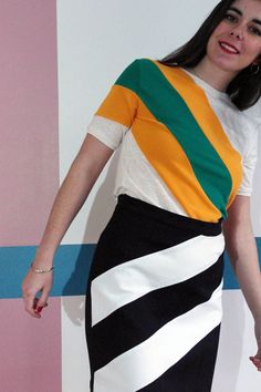 The colours and the graphics of this top are a vector of good mood. Its vitaminized stripes in orange terry cloth and green jersey will energize your look and transport you to the Eighties.  It can be perfectly combined with the Daisy skirt for a guaranteed optical effect.  The fabrics that make up this top are sourced from unused fashion house stocks to combine quality and responsible fashion.  Composition: white jersey: 60% linen 40% cotton, orange terry cloth stripe: 100% polyester, green str Light Dress, Embroidered Shorts, White Jersey, Beautiful Skirts, Terry Cloth, Green Stripes, Womens Clothing Tops, Blue And Purple, Beautiful Dresses