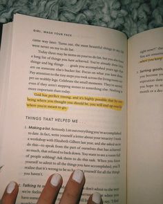 a person's hand holding an open book with yellow highlights on it and the words, things that help me