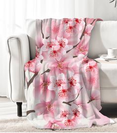 This exquisite pink cherry blossom blanket throw will add a touch of elegance and luxury to your home decor. Made from soft and cozy materials, this beautiful throw features a delicate cherry blossom design that is sure to impress. Whether you drape it over your sofa for a pop of color or curl up with it on chilly evenings, this blanket throw is both stylish and functional. Perfect for adding a floral touch to any room, this pink cherry blossom blanket throw makes a wonderful gift for yourself o Cherry Blossom Blanket, Pink Cherry Blossom, Pink Cherry, Blossom Design, Blanket Throw, Stylish Home, Home Accessory, Cherry Blossom, Blankets & Throws