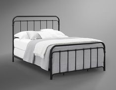 a black metal bed frame with white sheets and pillows on it, against a gray background