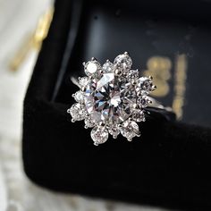 Moissanite diamond blossom halo engagement ring, VVS 3 carat round brilliant moissanite stone, engagement ring set in white gold plated 925 sterling silver with floral cluster micropavé on frame. Delicately crafted glamorous bridal wedding promise ring, super sparkly and stunning. Comes with luxurious velvet ring box. 💎 Features: ♥ Material: 925 sterling silver ♥ Main stone: Moissanite Gemstone ♥ Color: VVS ♥ Carat: 10mm, 3 carat approximately 💎 Details: ♥ Approximate Measurements: - Mainstone Diameter: 10mm - Whole Diameter: 13mm 🎁 Packing & Shipping: ♥ All our jewelry will be shipped with beautiful gift wrap packaging ♥ Handwrite gift notes/cards available upon request ♥ SAME DAY& FREE US Domestic Shipping available ♥ International customers: We ship worldwide! But we are not responsi Snowflake Ring, Ring Cluster, Floral Halo, Snowflake Shape, Fleur Design, Bling Wedding, Round Diamond Ring, Bridal Wedding Rings, Writing Gifts