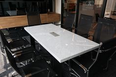 a table and chairs in an office setting