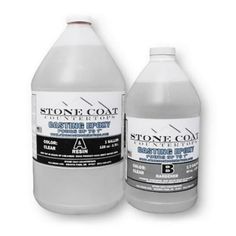 two bottles of stone coat paint sitting next to each other