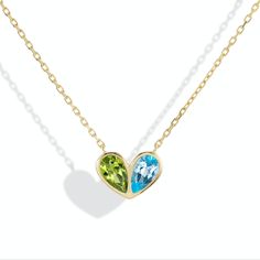 Jumbo Sweetheart Necklace Peridot & Blue Topaz Yellow Gold Multi-stone Necklace For May Birthstone, Yellow Gold Heart Cut Gemstone Necklace, Green 14k Gold Heart Pendant Necklace, Heart-shaped Yellow Gold Birthstone Necklace, Yellow Gold Heart Cut Multi-stone Jewelry, Heart Cut Multi-stone Yellow Gold Jewelry, Green Blue Topaz Jewelry For Gift, Green Blue Topaz Jewelry Gift, Yellow Gold Multi-stone Jewelry For Valentine's Day