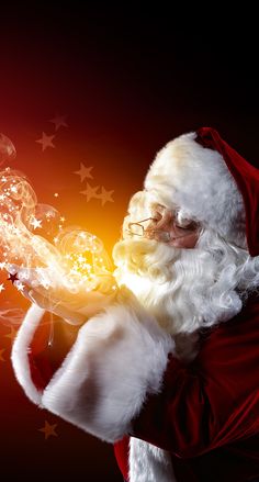 a man dressed as santa claus blowing bubbles