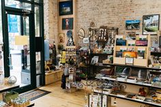 the inside of a store with many items on display