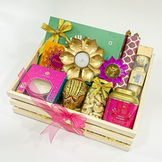 a wooden box filled with lots of different items