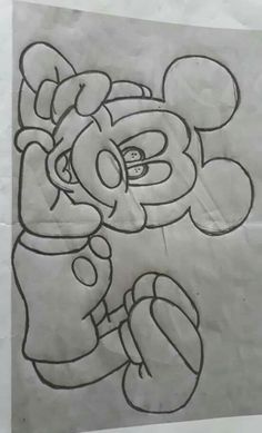 a drawing of mickey mouse on paper