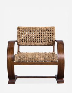 a wooden bench with woven seat padding on it's armrests and back