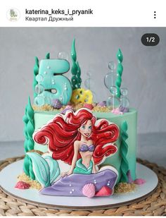 the little mermaid cake is decorated with fondant